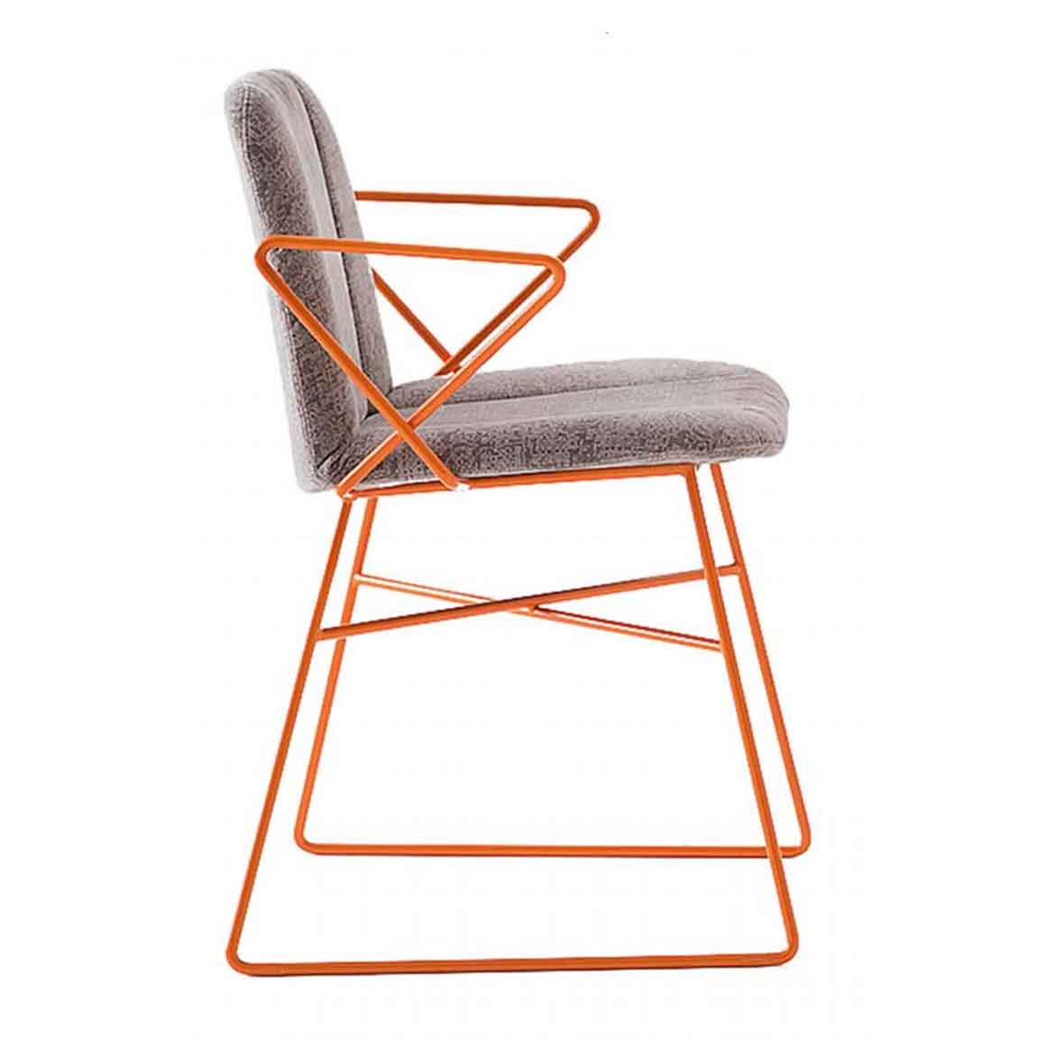 Chrome-plated or varnished metal, standard colours: white and black, but non standard colours are also available. Upholstered seat. Available in a wide range of textiles and leather finishing, also in COM.